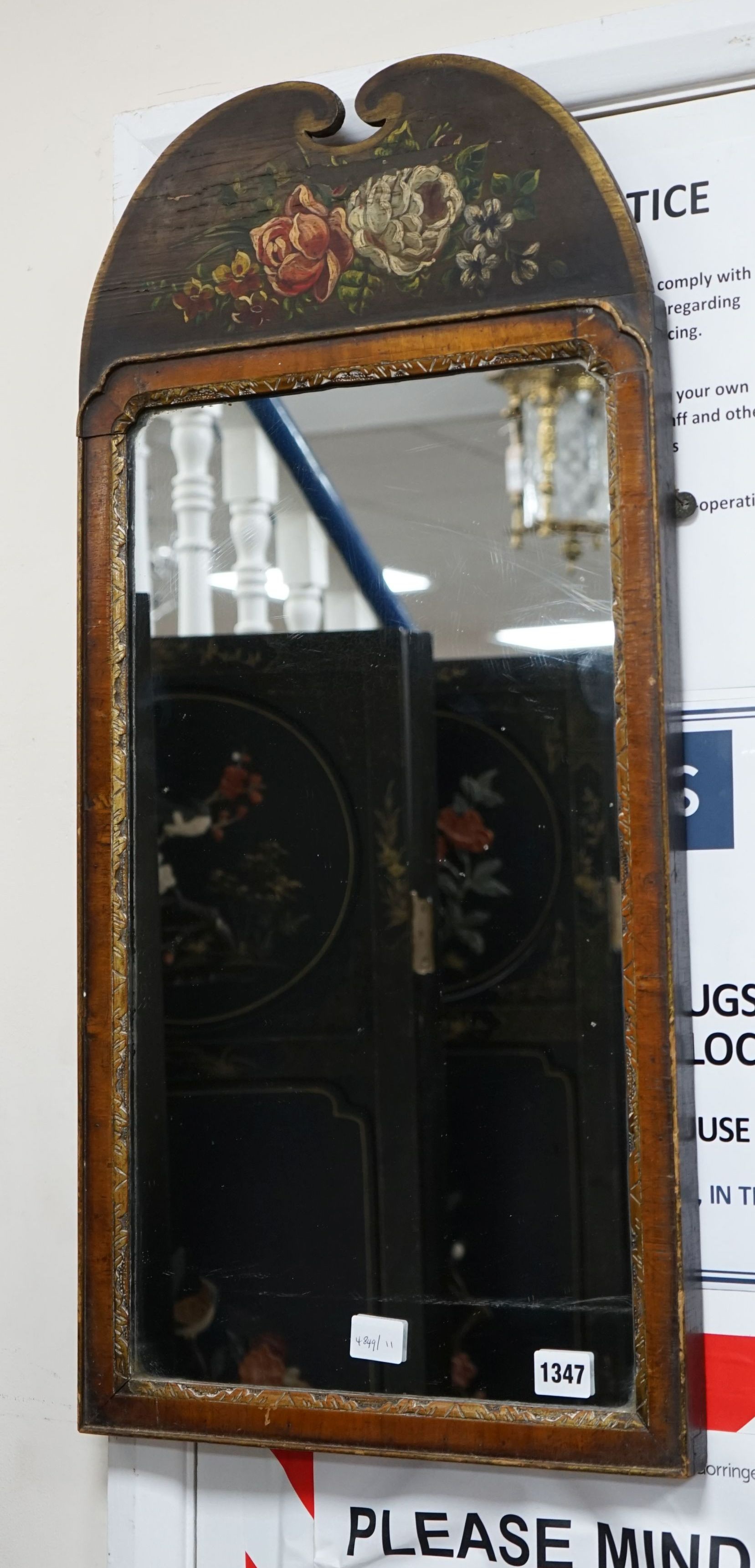 An 18th century style painted parcelgilt walnut wall mirror, width 36cm, height 76cm